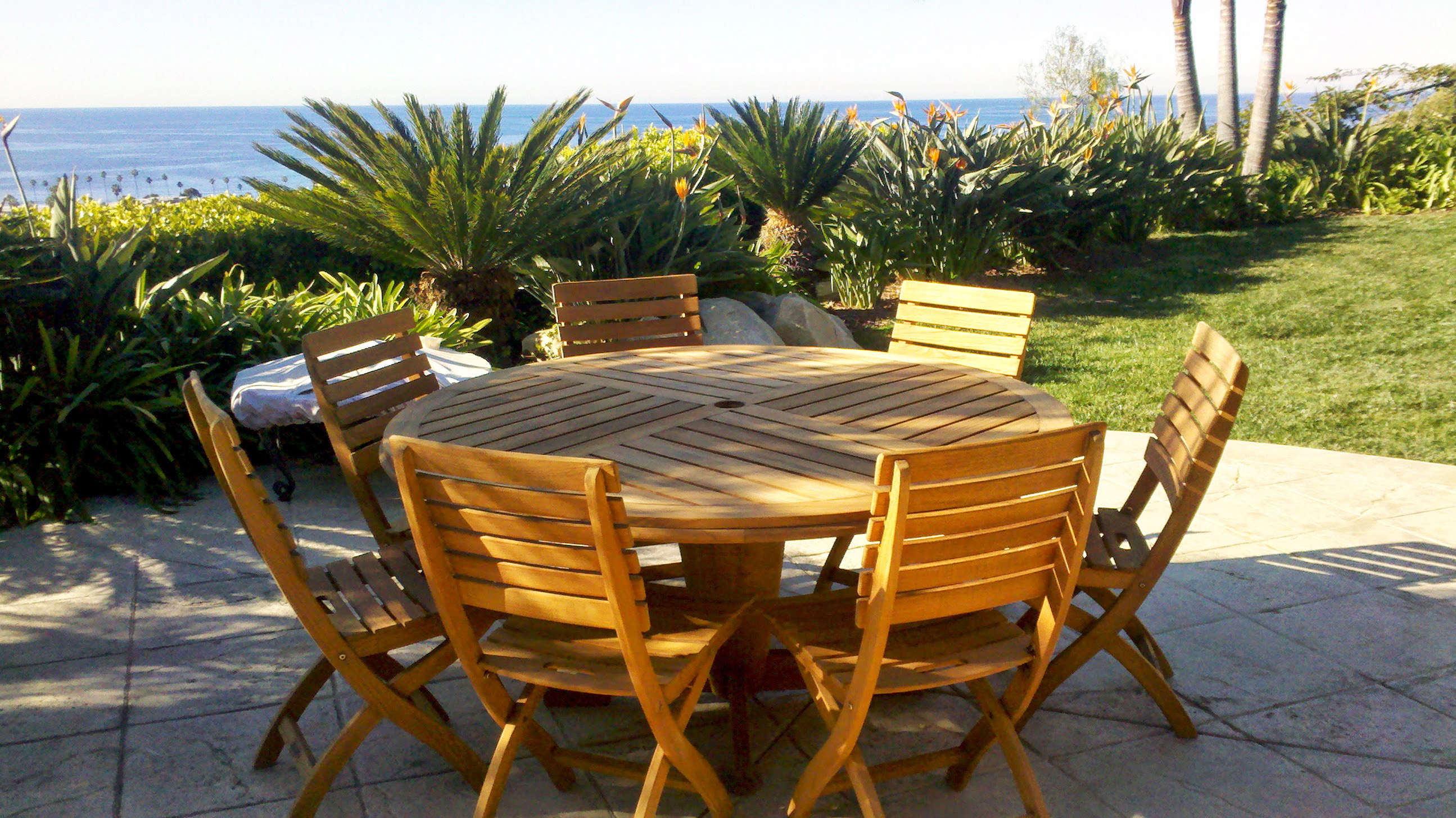 Table set restored in Newport Beach | OC Teak